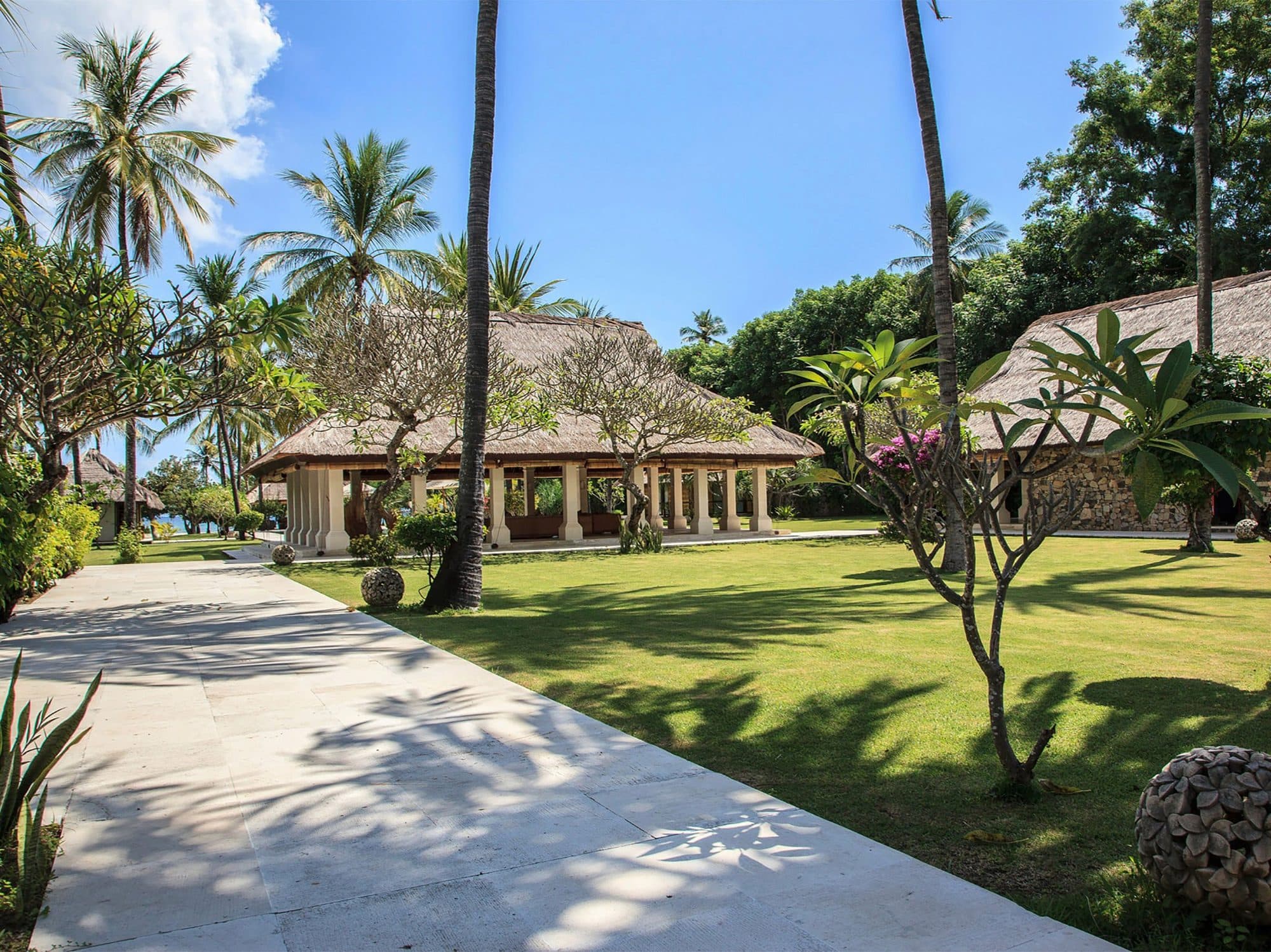 Sepoi Sepoi — the garden path to the thatched pavilions · Lombok, Indonesia