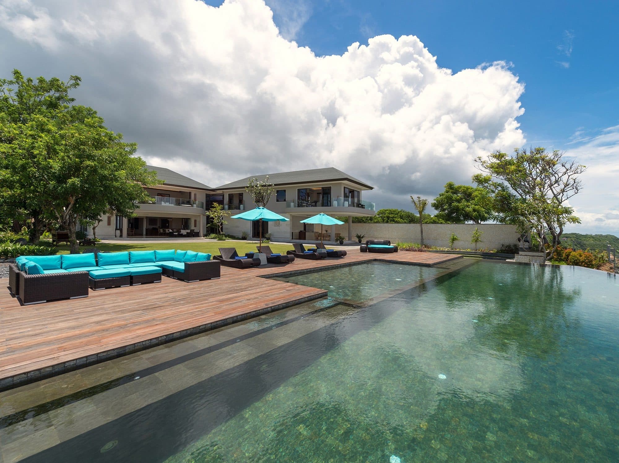 The Pala — the infinity pool and deck with the villa behind · Bali, Indonesia