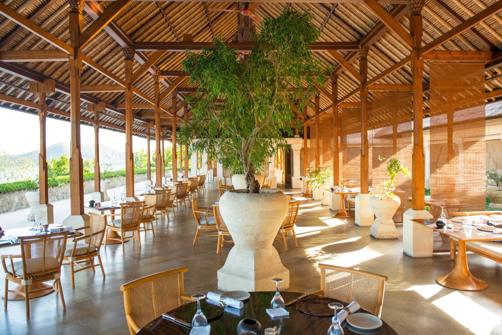 A celebration setting on the lawn above the sea at Amankila