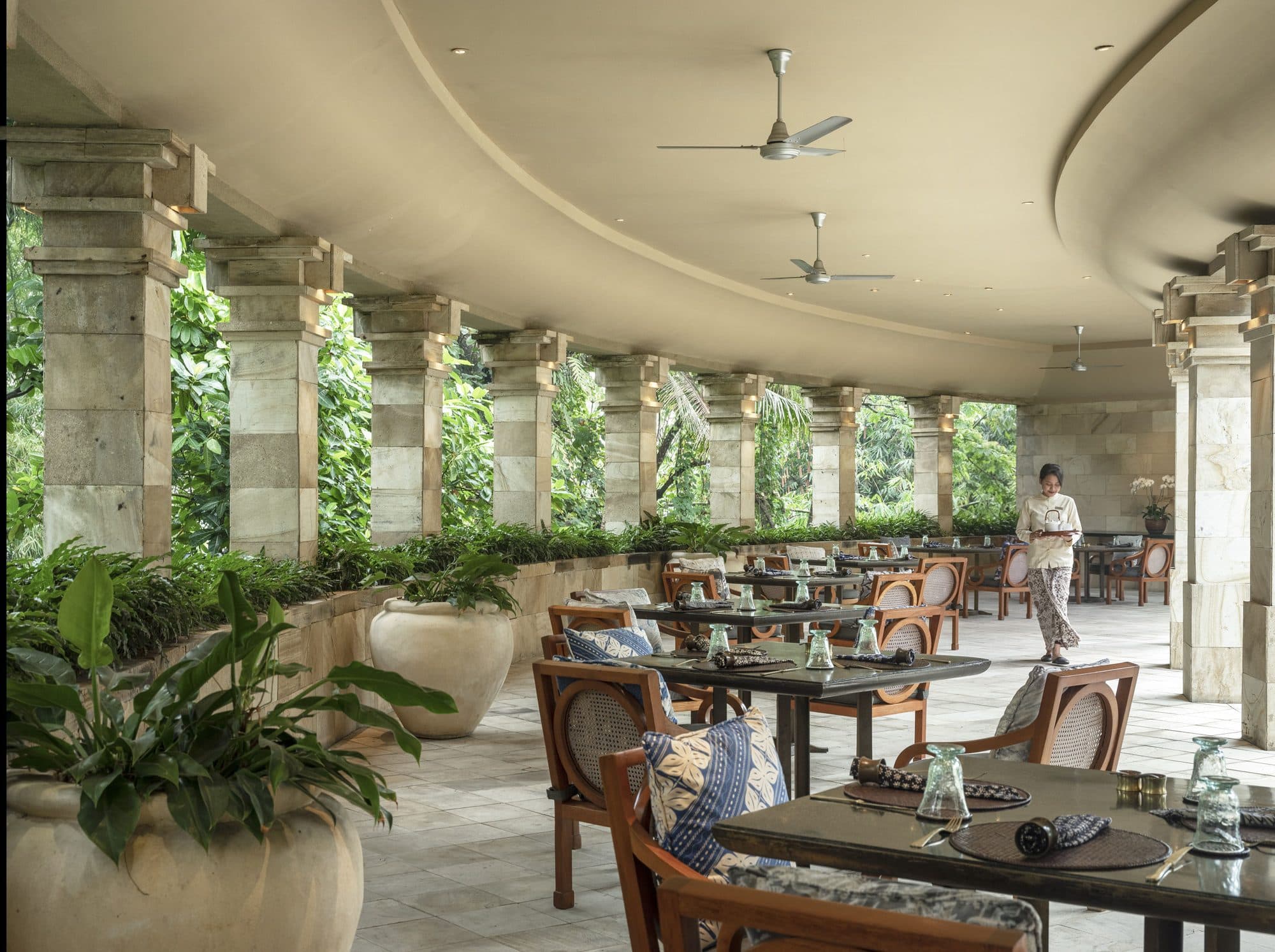 Amanjiwo — the colonnaded restaurant open to the gardens · Yogyakarta, Indonesia