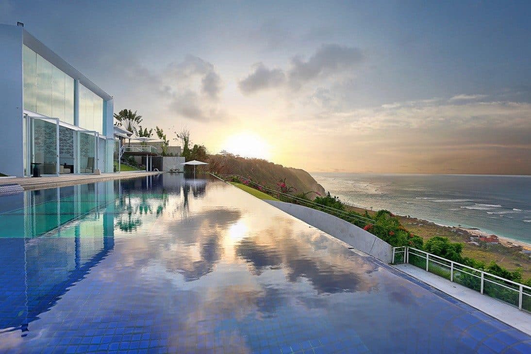 Latitude — the infinity pool beside the villa at sunset · Ungasan, Indonesia