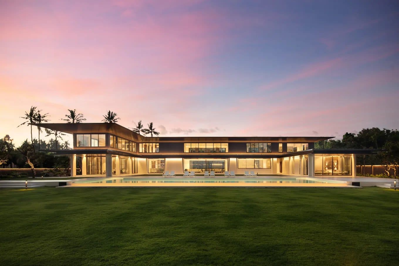 Saba Estate — the villa across the lawn at dusk · Saba, Indonesia