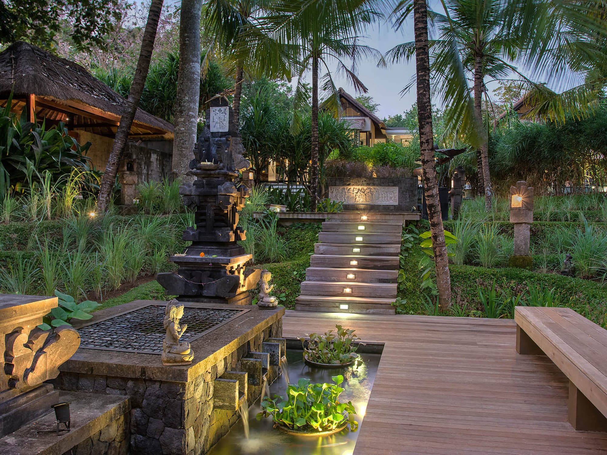 Seseh Beach Villas — a lantern-lit path through the tropical garden · Seseh, Indonesia