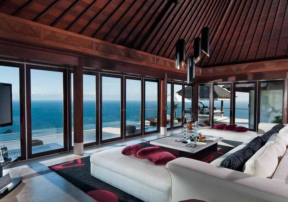 The Edge — the living room with floor-to-ceiling ocean views · Uluwatu, Indonesia