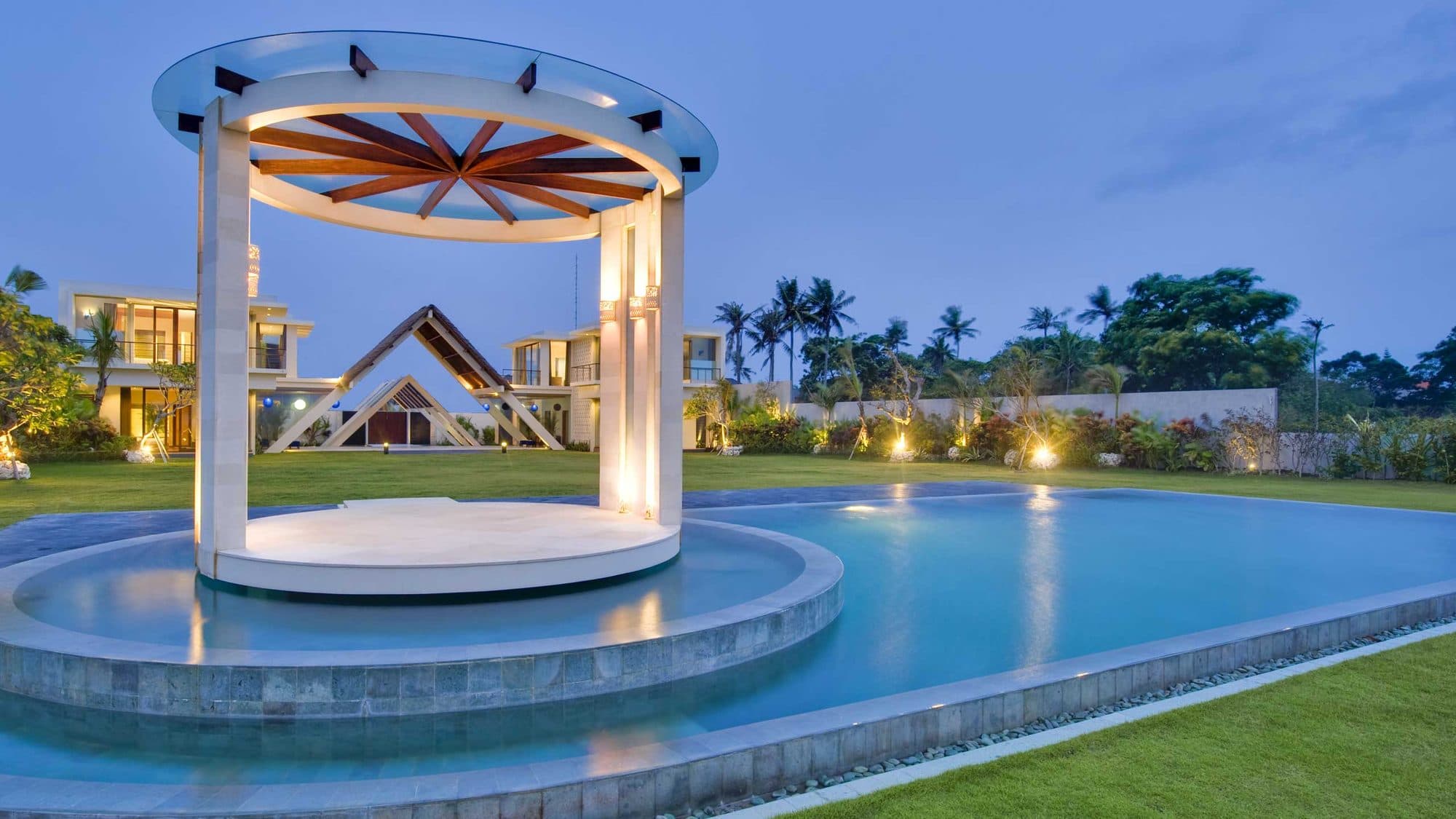 Villa Phalosa — the round pool pavilion at dusk · Seseh, Indonesia